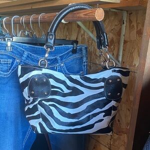 Chic Zebra Pattern Shoulder Bag with Black Trim